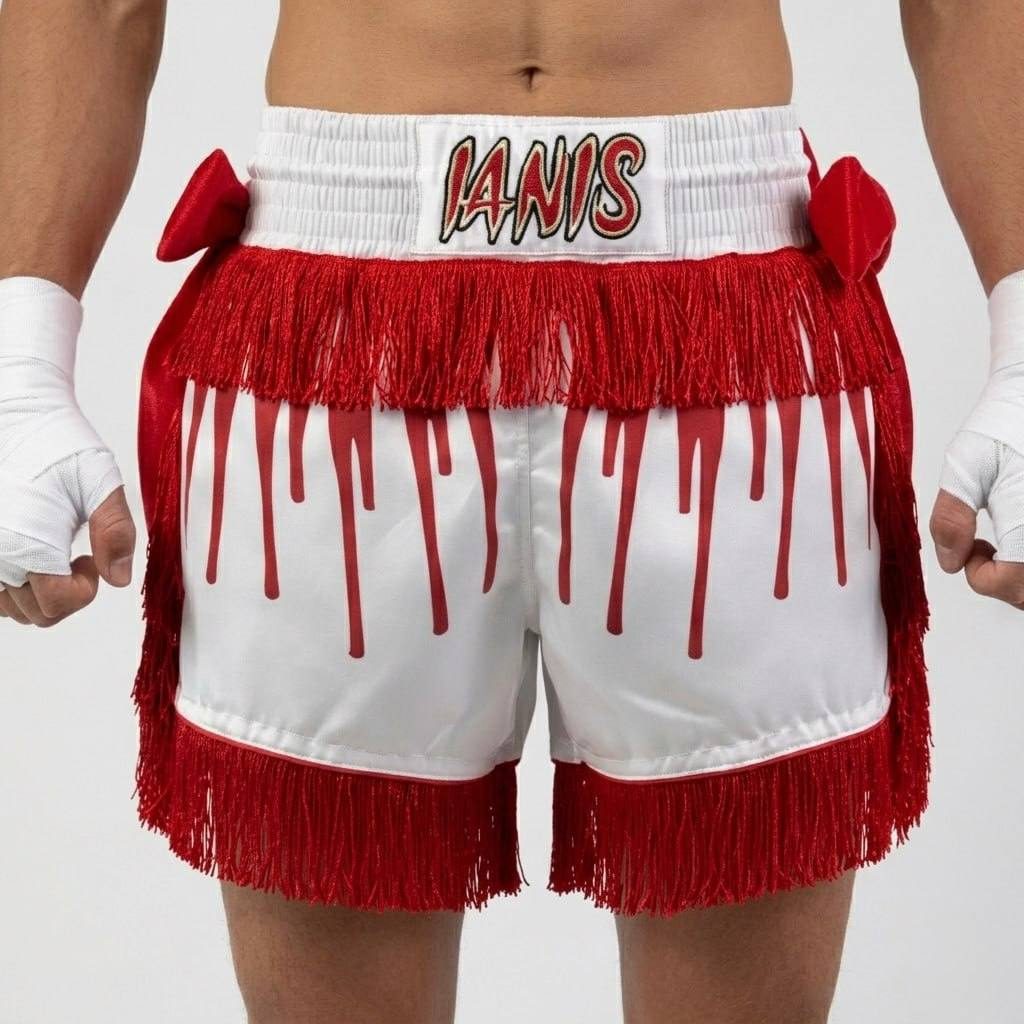 Cascade custom Muay Thai shorts with flowing drip-line cascade pattern, wide legs, and side slits.